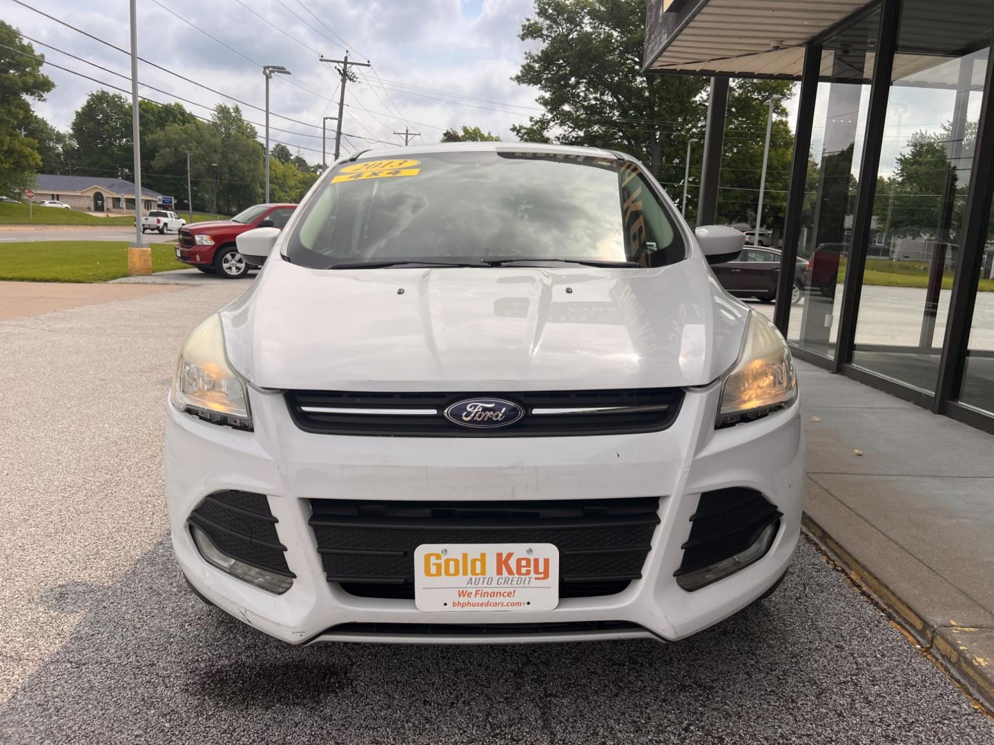 2013 Oxford White Ford Escape SE 4WD (1FMCU9GX9DU) with an 1.6L L4 DOHC 16V engine, 6-Speed Automatic transmission, located at 1633 W Kimberly, Davenport, IA, 52806, (563) 323-5341, 41.559456, -90.598732 - Photo#1